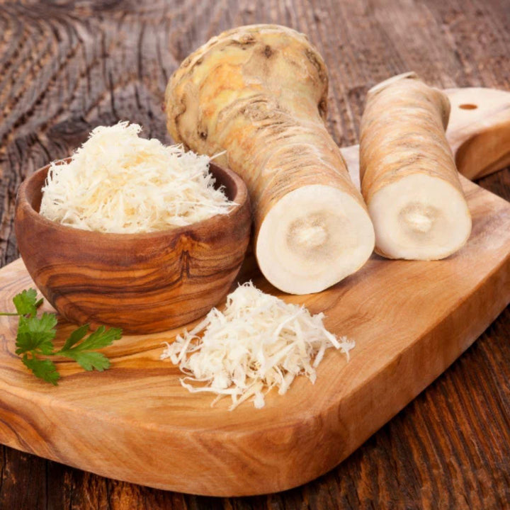 Fresh horseradish roots with grated horseradish on a board, from Sharbatly.