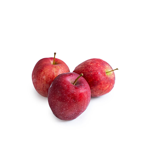 Fresh organic Red Delicious apples from Sharbatly, shown in a 0.550 kg pack, with vibrant red skin and crisp texture.