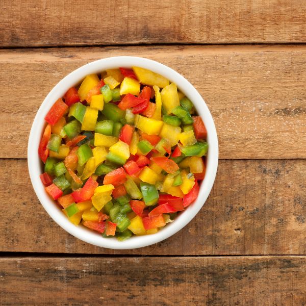 Mixed capsicum peppers from Local Market in a 0.5 kg pack, colorful fresh vegetable with red, green, and yellow bell peppers.