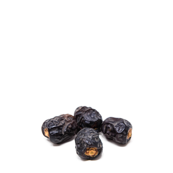 Ajwah dates from Sharbatly, 0.5 kg pack, showing ripe, glossy date fruits with a rich brown color and textured surface.