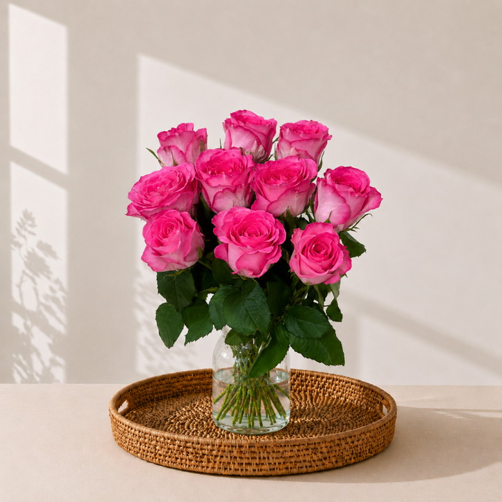 Roses, Simply Pink fresh-cut flowers arranged in a clear vase at home, from Sharbatly.