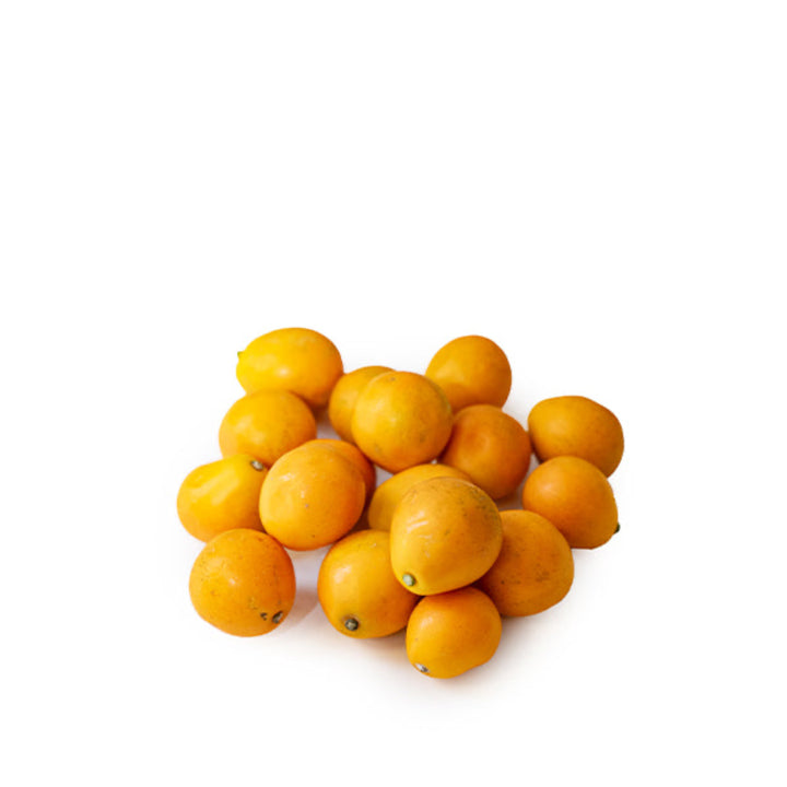 Seedless extra sweet kumquats from Sharbatly in a 0.5kg pack, shown in a close-up image highlighting their bright orange color.