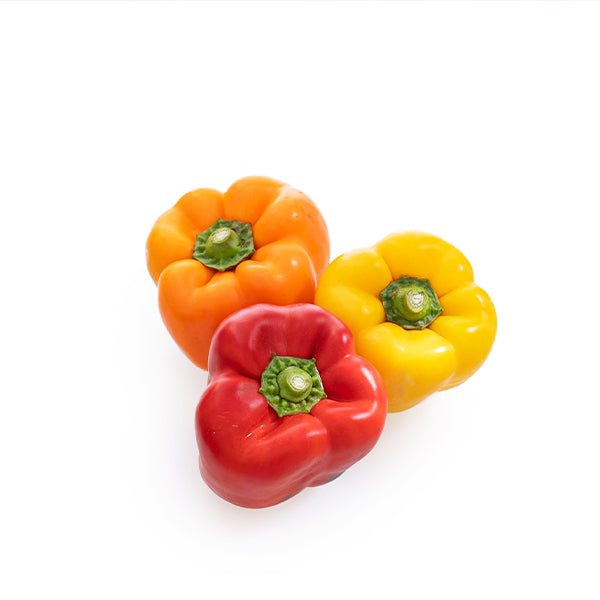 Mixed capsicum peppers in a 1 kg pack from Local Market, fresh colorful bell and sweet peppers for cooking or salads.
