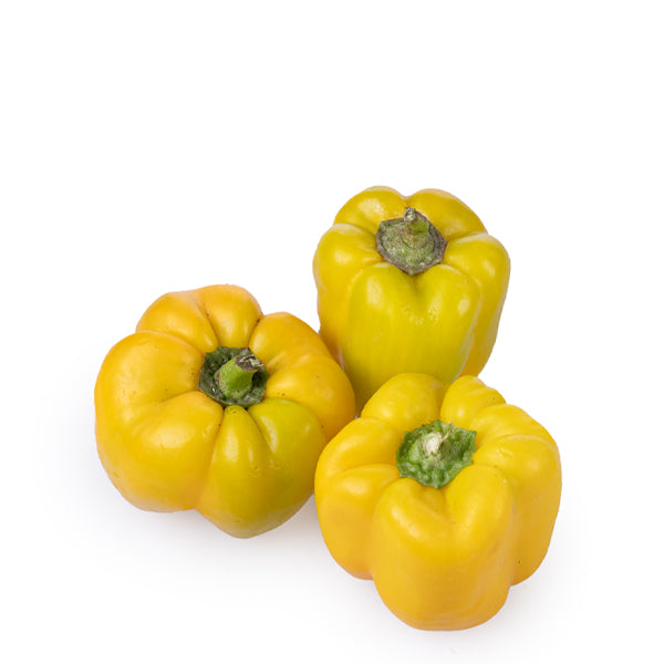Yellow capsicum peppers from Local Market, 1 kg pack, fresh and vibrant vegetable in a clear plastic bag.