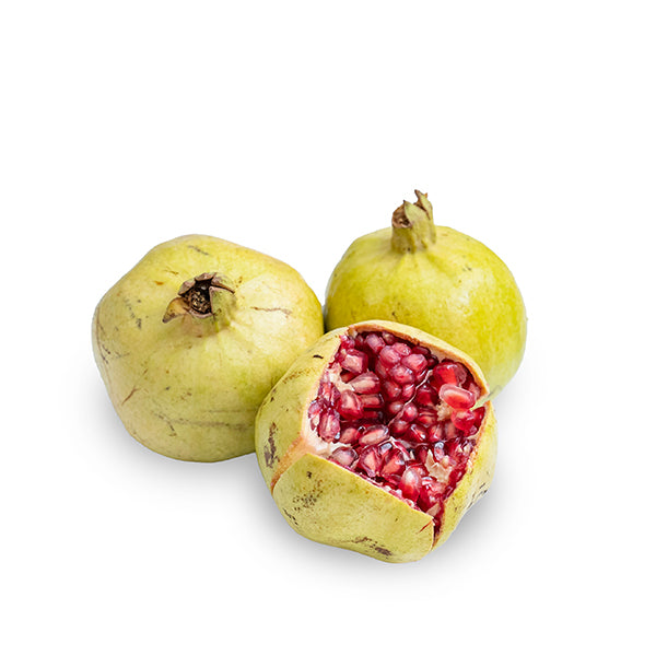 Fresh Yemeni pomegranates from Sharbatly, 2 kg pack, showcasing vibrant red fruit with smooth skin and juicy seeds.