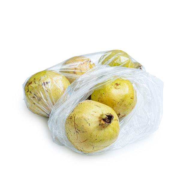 Fresh Yemeni pomegranates in a 2 kg pack by Sharbatly, showcasing vibrant, ripe fruit with textured skins.