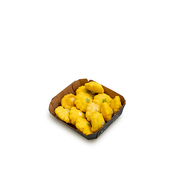 Yellow patty pan squash from Holland, fresh vegetable in a 0.2 kg pack, with vibrant yellow, round, scalloped edges and smooth skin.