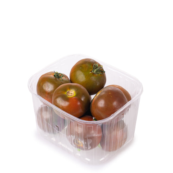 Fresh Kumato tomatoes in a 1 kg pack by Groots, showcasing shiny, ripe red and green vegetables on a white background.