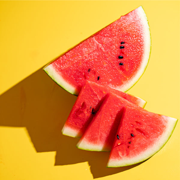 Fresh watermelon with red flesh, premium Thai fruit, displayed as a single piece from Thailand.
