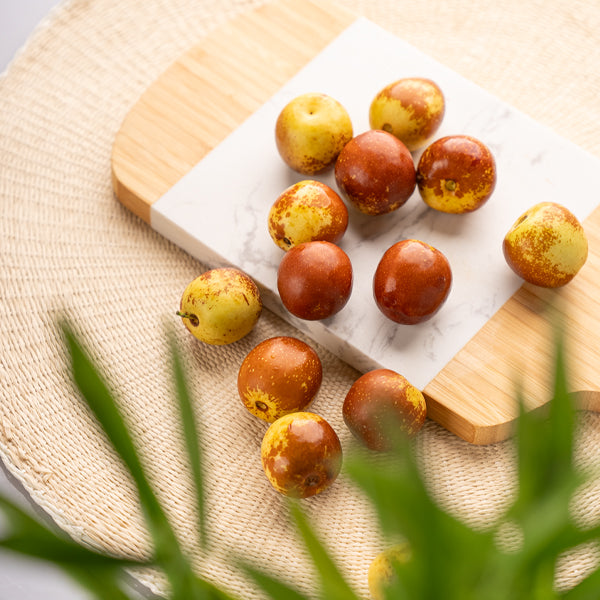 Sharbatly winter jujubes, Chinese red dates, 0.5kg pack, showing ripe, glossy red dates with a smooth surface.
