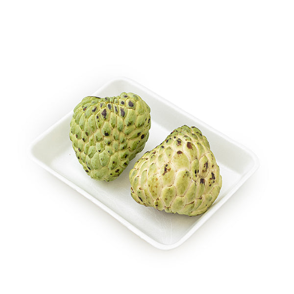 Fresh custard apples from Local Market, 1 kg pack, showing ripe, green exterior and soft interior ready to eat.