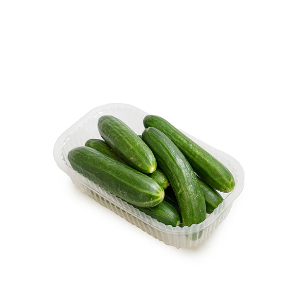 Fresh green cucumbers from Local Market, 1 kg pack, showing smooth skin and vibrant color on a white background.