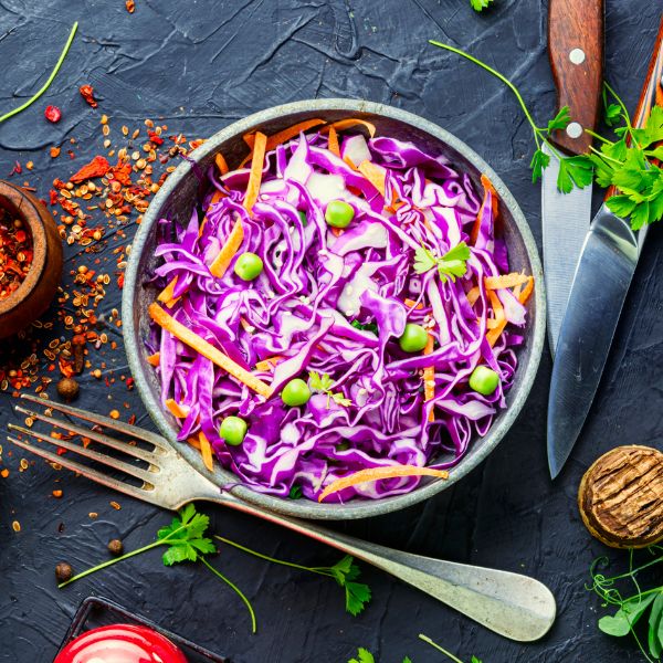 Fresh red cabbage vegetable from Local Market, single whole head with vibrant purple leaves and crisp texture.