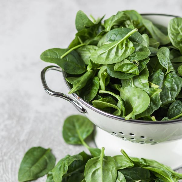 Fresh baby spinach hydroponic vegetable in a 0.125 kg pack by Babul, showcasing vibrant green leafy greens.