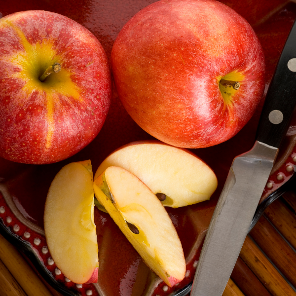 Organic Apple Royal Gala fruit from Sharbatly in a 0.550 kg pack, fresh and vibrant with red and yellow skin.