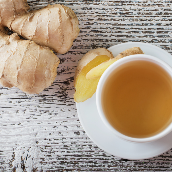 Fresh ginger vegetable in a 0.5 kg pack from Sharbatly, showcasing whole, peeled ginger roots on a clean surface.