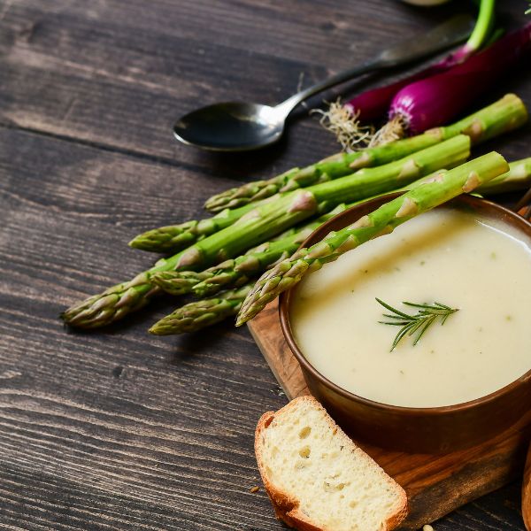 Fresh green Thai asparagus vegetables in a 0.45 kg pack, showcasing vibrant, crisp asparagus stalks on a natural background.