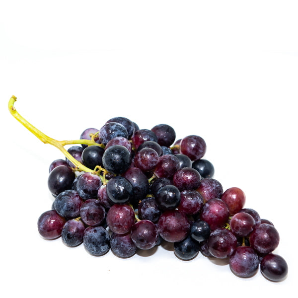 Black grapes from Sharbatly in a 1kg pack, fresh and ripe fruit with dark purple skin and cluster of grapes visible.