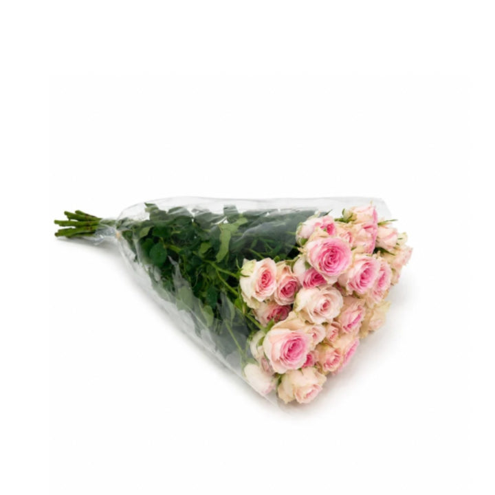 Bouquet of 10 spray roses from Vegpro Kenya in a garden setting, perfect for home decor and uplifting moods.