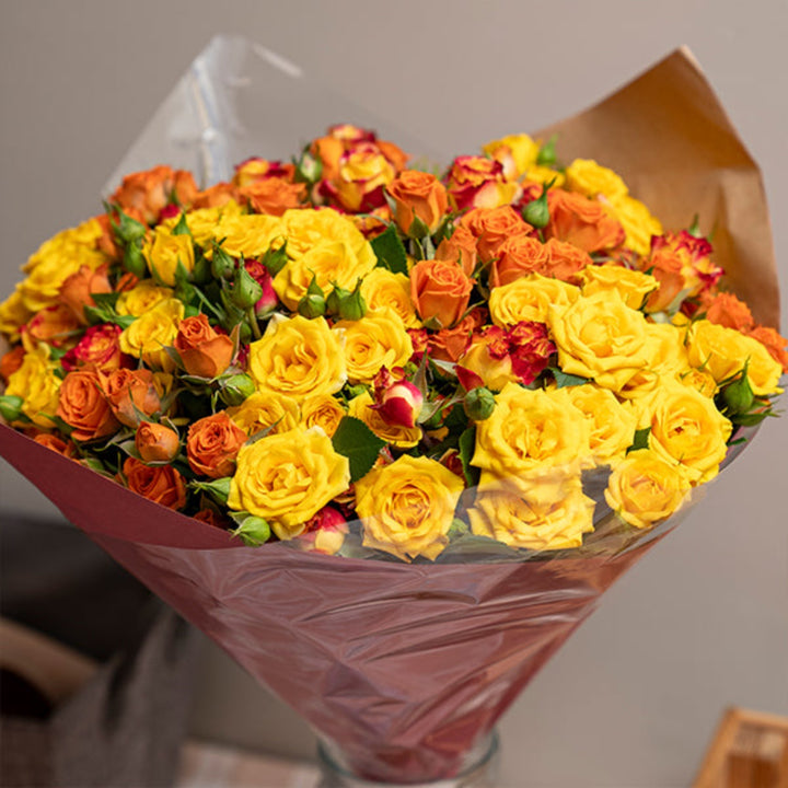 Sunshine luxury bouquet of 30 baby roses from Mix Flower Bouquet, showing vibrant yellow blooms arranged in a lush floral display.