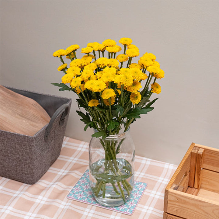 Bright yellow Santini Sunny chrysanthemums on 10 stems by SQ Flora Kenya, showcasing vibrant flower blooms.