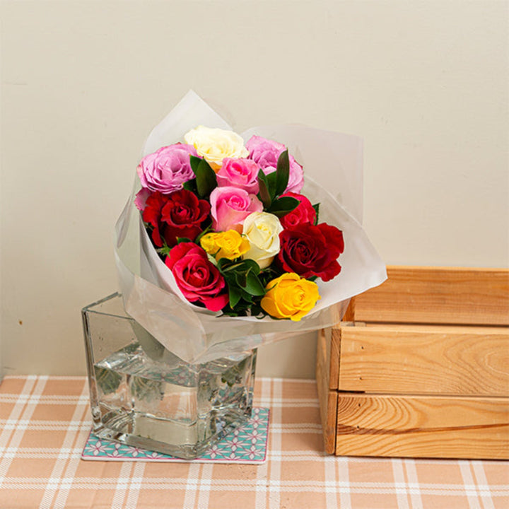 Colorful Happy Day Bouquet with 12 stems of mixed flowers arranged in a vibrant bouquet by Mix Flower Bouquet.