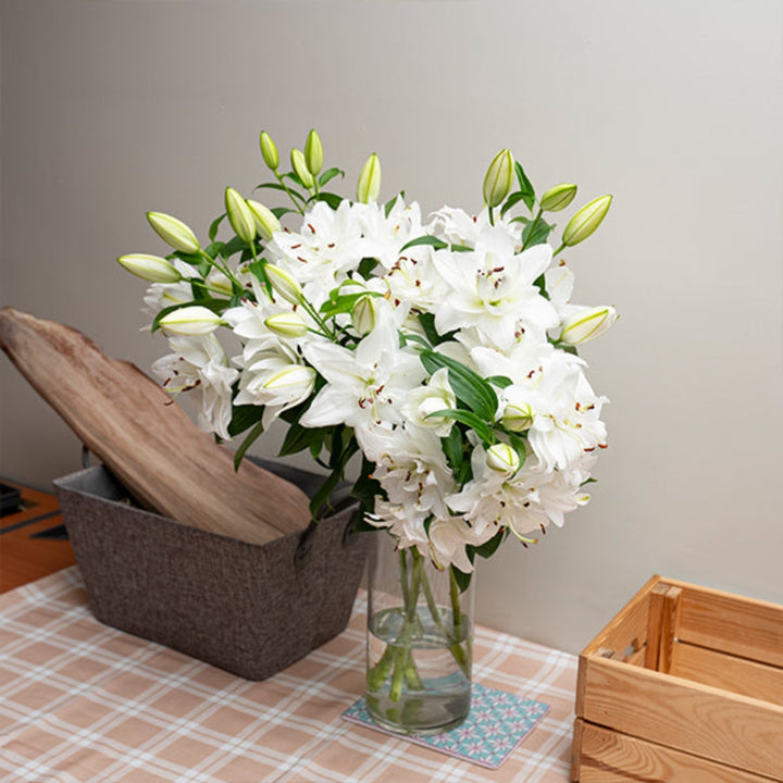 Bouquet of 5 scented Oriental Dejima lilies with double petals, arranged in a floral display by SQ Flora Kenya.