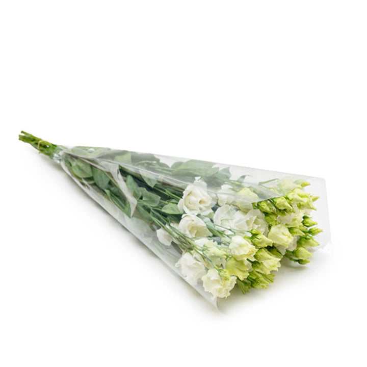 Five stems of white Lisianthus (Eustoma) flowers from Fresh Flower Holland, showcasing delicate petals and lush foliage.