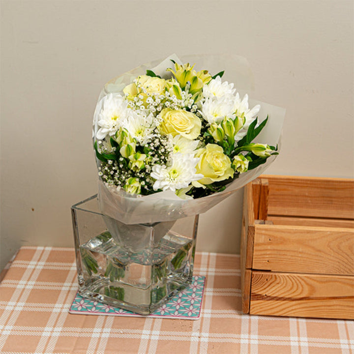 Bright mixed flower bouquet with 12 stems, featuring colorful blooms and greenery from Mix Flower Bouquet.