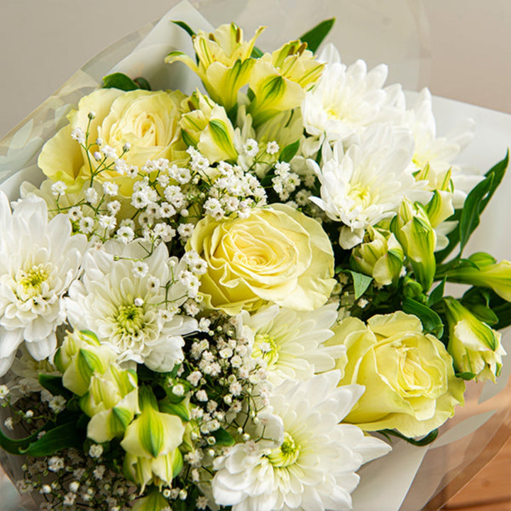 Mix Flower Bouquet Pure Calm bouquet with 12 colorful stems of fresh, fragrant flowers arranged in a natural bouquet.