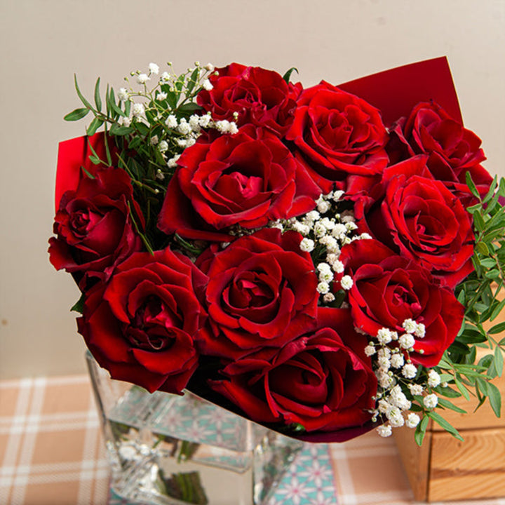 Red Roses Romance Bouquet with 15 stems, featuring vibrant roses arranged in a lush bouquet by Valentine Lines.