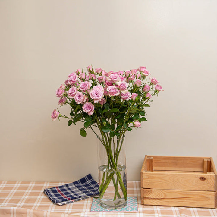Bouquet of 10 Roses Baby Leila flowers by SQ Flora Kenya, fresh pink blooms arranged in a natural bouquet.