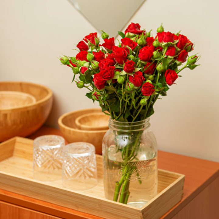 Bouquet of 10 red Roses Baby Red flowers from SQ Flora Kenya, showcasing vibrant blooms and lush green stems.