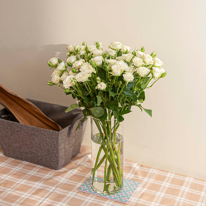 White roses baby flower bouquet with 10 stems by SQ Flora Kenya, fresh and delicate floral arrangement.