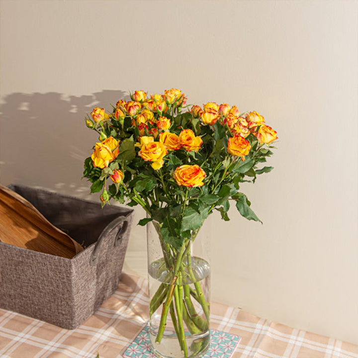 Bouquet of 10 rose stems with baby eyeliner flowers from SQ Flora Kenya, showcasing fresh, vibrant floral arrangement.