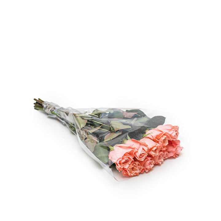 Black Tulip Be Sweet Pink Roses, 10 stems of fresh pink flowers arranged in a bouquet.