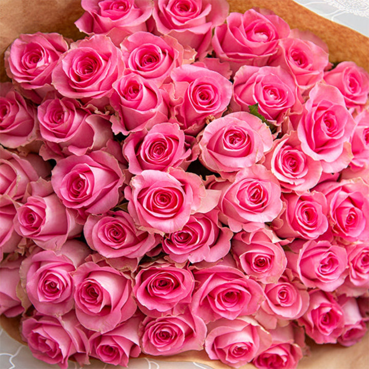 Pink roses luxury bouquet with 50 stems from Mix Flower Bouquet, arranged in a vibrant, elegant floral display.