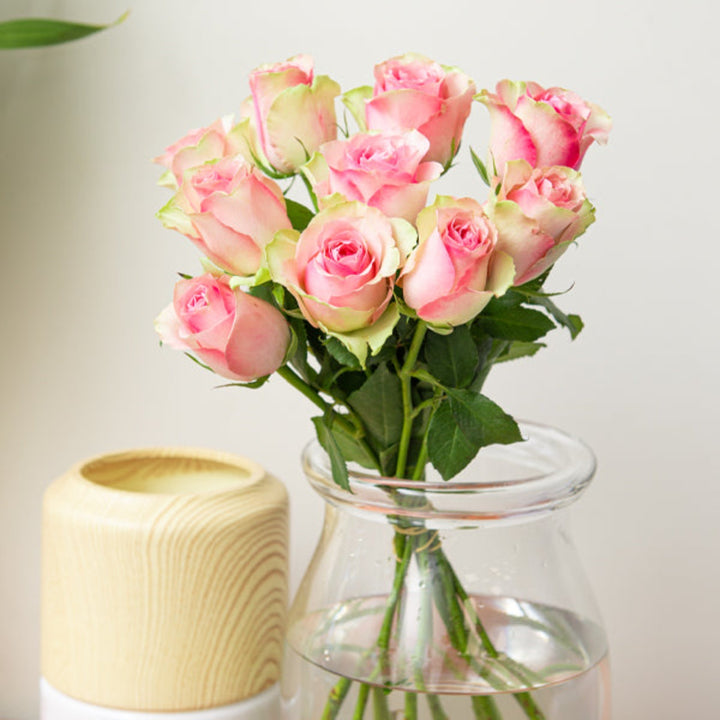 Bouquet of 10 Royal Athena roses from SQ Flora Kenya, fresh flower stems with vibrant blooms and green foliage.