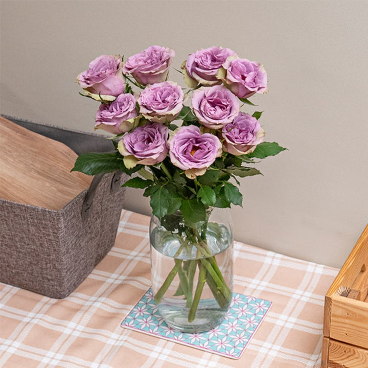 Purple roses from Black Tulip's Samantha's Bridal collection, showcasing 10 elegant flower stems in a natural arrangement.