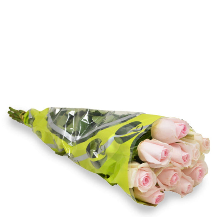 Bouquet of 10 vibrant Sweet Revival roses from SQ Flora Kenya, showcasing lush red petals and green foliage.