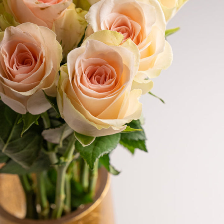 Bouquet of 10 fresh roses and veronica flowers from SQ Flora Kenya, arranged in a colorful floral display.