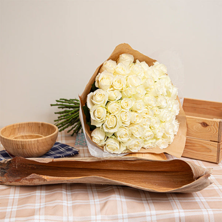 Luxury white rose bouquet with 50 stems from Mix Flower Bouquet, showcasing elegant, fresh roses arranged in a beautiful display.