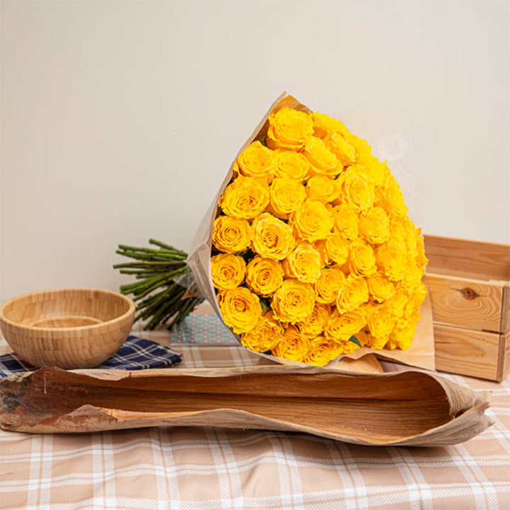 Yellow luxury rose bouquet with 50 stems arranged in a lush floral display by Mix Flower Bouquet