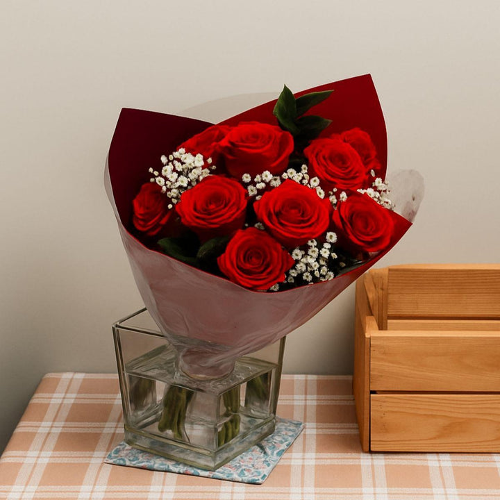 Colorful Ruby Love bouquet with 16 mixed flower stems, featuring vibrant blooms arranged in a natural floral bouquet.