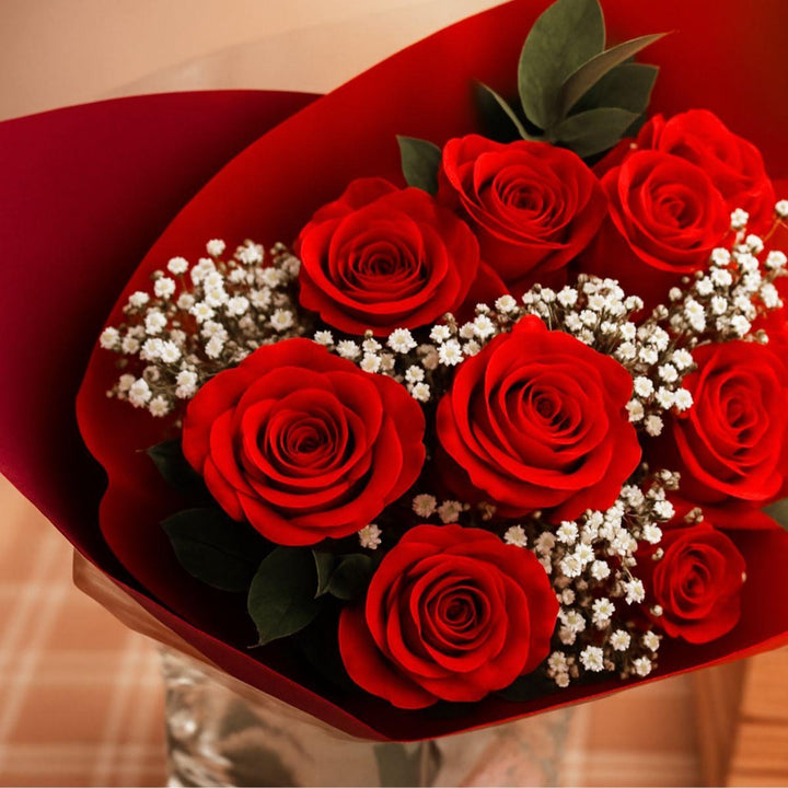 Mixed flower bouquet with 16 ruby love stems featuring vibrant blooms and lush green leaves, perfect for gift or decoration.