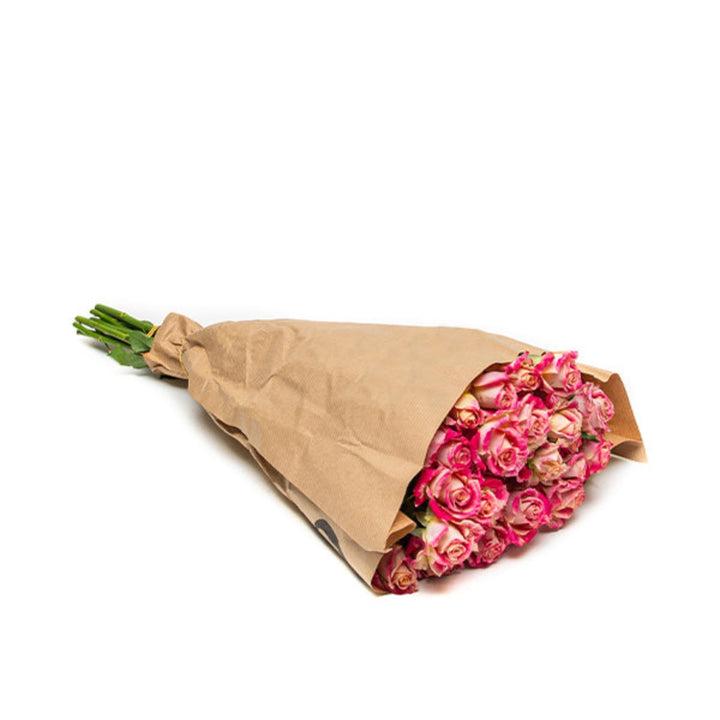 Bouquet of 10 spray roses from Vegpro Kenya, garden-grown flower stems with vibrant blooms and lush green foliage.