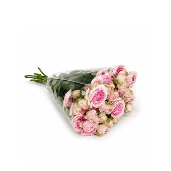 Bouquet of 10 spray roses in Candy Flow color from Vegpro Kenya, arranged in a garden setting for home decoration.