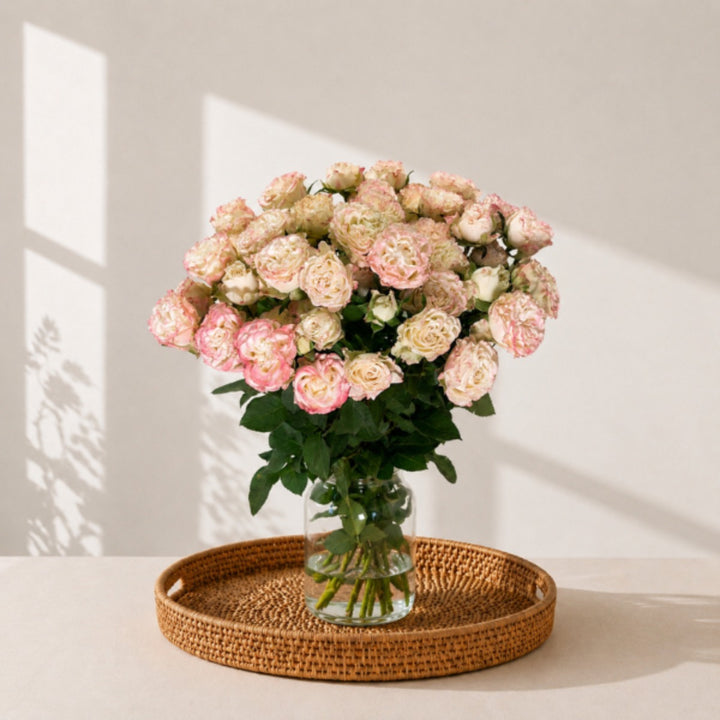Bouquet of 10 spray roses from Vegpro Kenya in a charming garden flow arrangement, ideal for home decor.