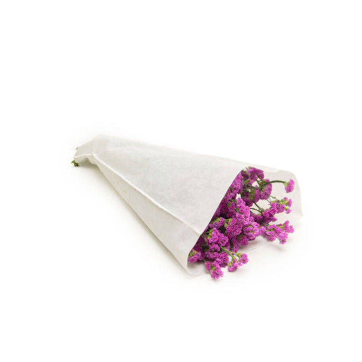Pink rose and statice flower stems from Gold Petals China, arranged with multiple pink blossoms on green stems.
