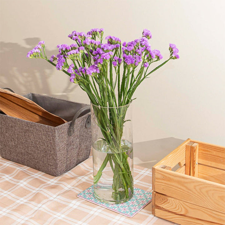 Purple Statices flower stems from SQ Flora Kenya, showing vibrant purple blooms arranged in a natural bouquet.
